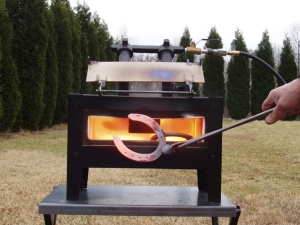 nc whisper deluxe forge with back door